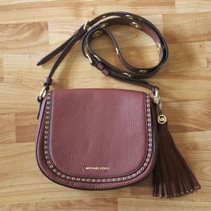NWOT Michael Kor Maroon crossbody bag with tassel